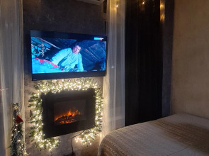 Апартаменты Квартира с Камином