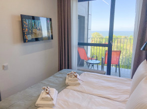 Апартаменты Sun City Apartments 10 с видом на море