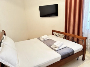 Апартаменты у моря с видом на город и горы