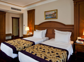 Отель GLK Premier The Home Suites & Spa