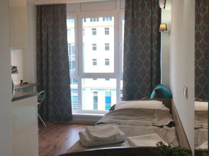 Апартаменты Маленькая студия с большим панорамным окном