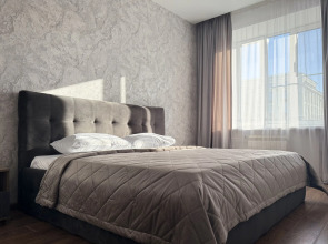 V Tsentre Goroda Apartments