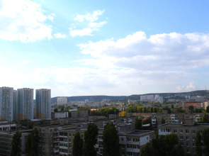 Апартаменты Apato Уютная студия с видом на город и горы