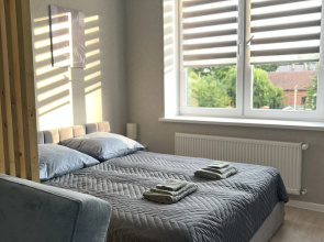 Квартира Cozy Scandi Apartment