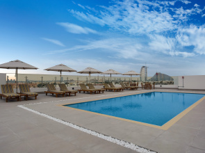 Отель Lemon Tree Hotel Jumeirah Dubai