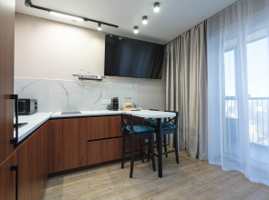 Квартира Новая студия в 5 минутах от ТРЦ Аура