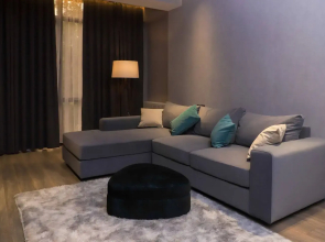 V Tsentre Goroda Apartments