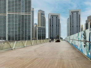 Апартаменты Сozy 1BR at Vida Residences Creek Beach