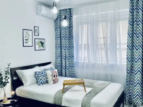 Stilnaya odnokomnatnaya Zigzag vozle parka i ozera Flat