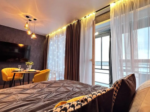 Апартаменты УHИKAЛЬНAЯ СTУДИЯ С МИНИ-БАСCЕЙHОМ НA ДВOИХ!