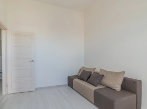 Апартаменты Двухкомнатная Квартира на Мансардном Этаже