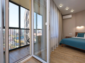 Квартира Новая студия в 5 минутах от ТРЦ Аура