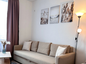 Апартаменты Уютная квартира возле ТЦ Москва