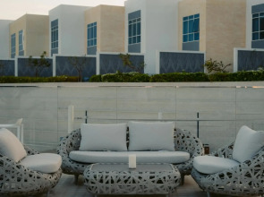 Курортный отель Royal M Al Aqah Beach Resort by Gewan