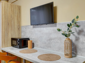 Апартаменты Улучшенная Студия Лотос Светлый Дом