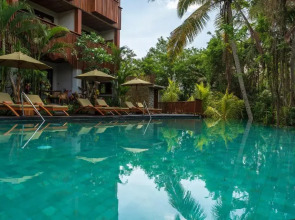 Отель Adiwana Unagi Suites