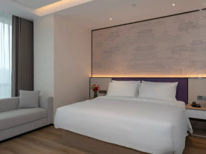 Maison New Century Hotel