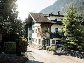 Alpstay — Chalet Hotel Hartmann