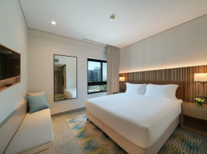 Отель Arabian Park Dubai, an Edge by Rotana Hotel