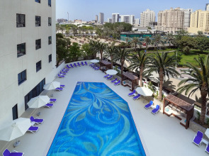 Отель Arabian Park Dubai, an Edge by Rotana Hotel