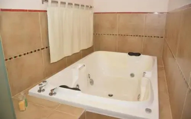 Pueblo Santo, Cabañas & Suites