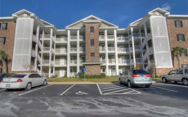 Magnolia Pointe 305-4820 Condo