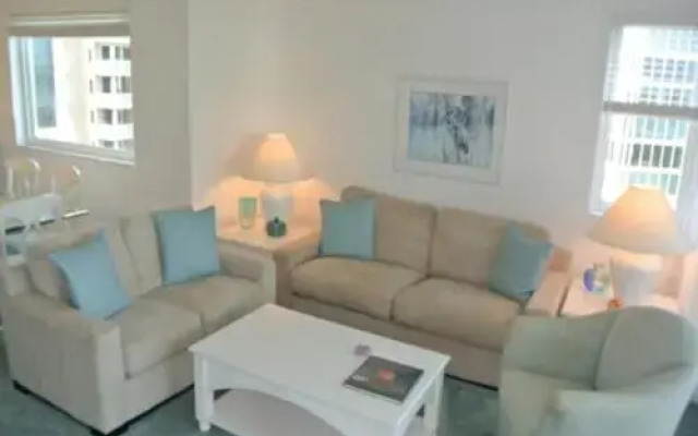 Deluxe Beachfront Condo Located in Prestigious Resort with Pool and Hot Tub by RedAwning