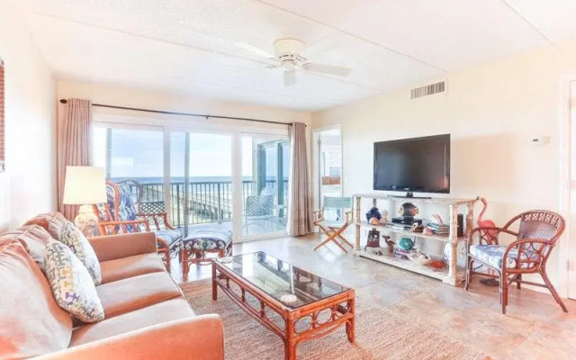 Upper unit Overlooking the Beautiful Outdoor Space and Pier by RedAwning