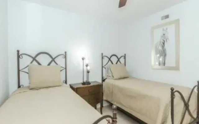Beautifully Furnished Gulf-Front Condo Just a Walk to the beach by RedAwning