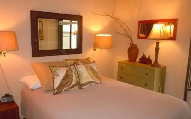 Two-Bedroom plus Den Deluxe Unit #124 by Escape For All Seasons