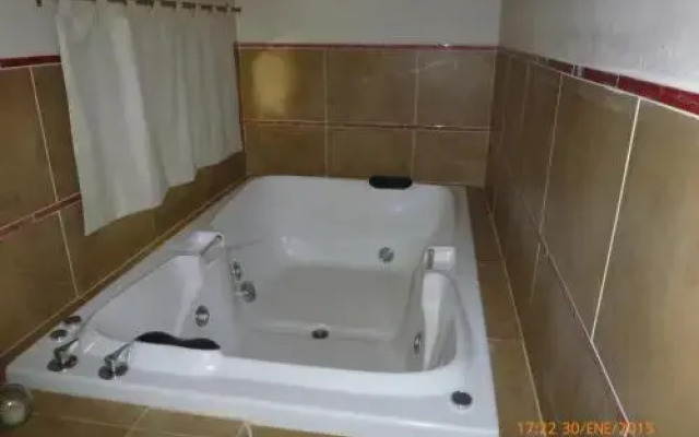 Pueblo Santo, Cabañas & Suites