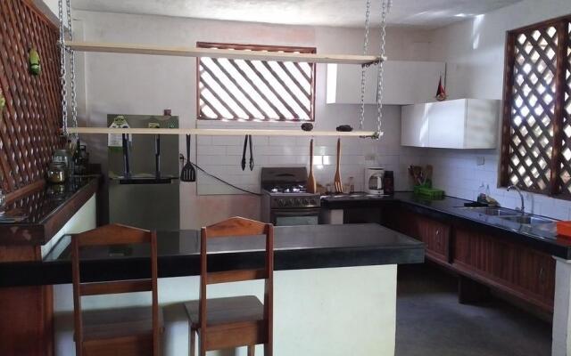 Paisajes del Tortuguero (On The Beach and Town Center)