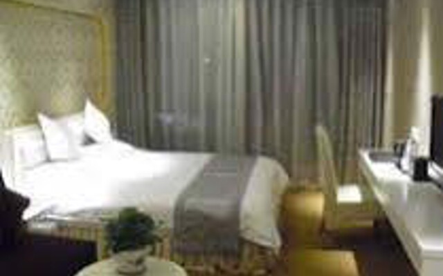 Отель Xinyi Holiday Hotel Puyan Road