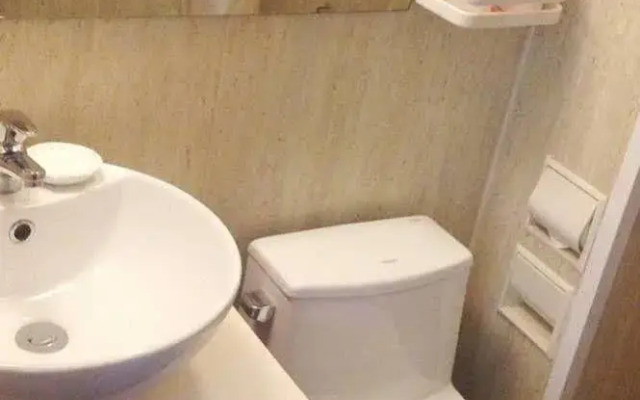 Izunco Inn Qingdao TV Mansion