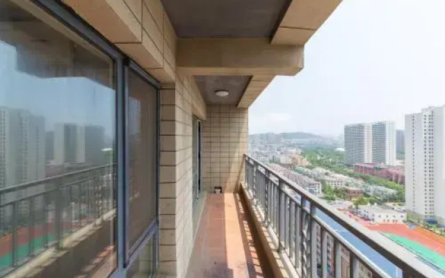 Aiqinhai ApartHotel