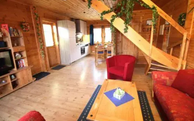 Der-Fuchsbau-Blockhaus-3-Hunde-willkommen