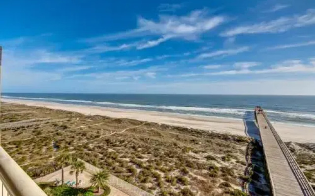 Oceanfront Condo with Beach Access, Pool, and Tennis Court by RedAwning