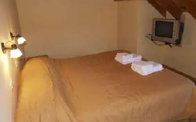 Hosteria y Cabañas Casa de Piedra