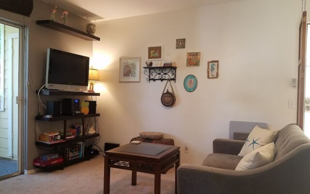 Fairway Terrace #I-104 by RedAwning