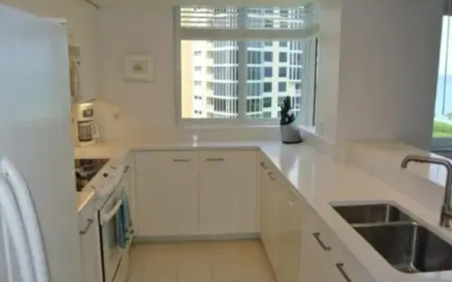 Deluxe Beachfront Condo Located in Prestigious Resort with Pool and Hot Tub by RedAwning