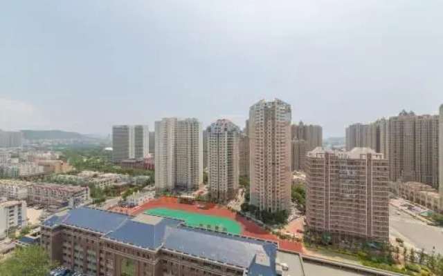 Aiqinhai ApartHotel
