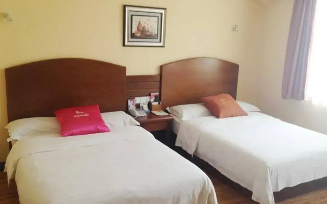 Izunco Inn Qingdao TV Mansion