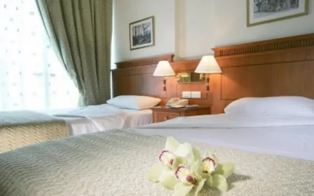 Queen Centre Arjaan by Rotana