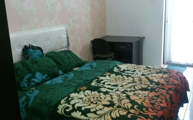 Rose Rooms @ Apartemen Margonda Residence by ZUZU