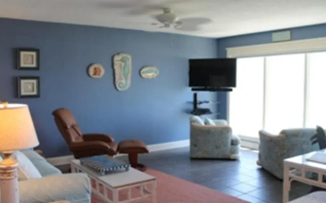 Coastline Condo with private Balcony to Enjoy Views of the Atlantic Ocean by RedAwning