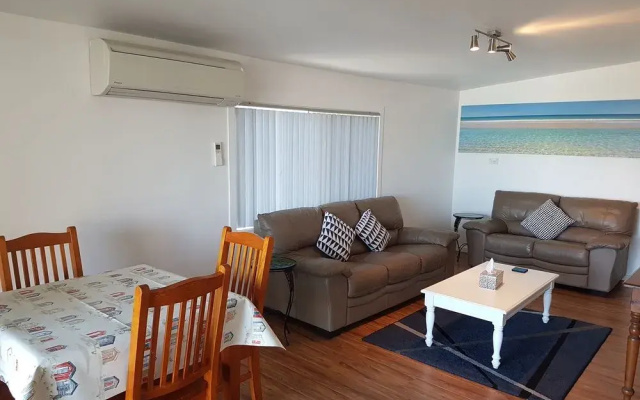 At the Beach Cottages