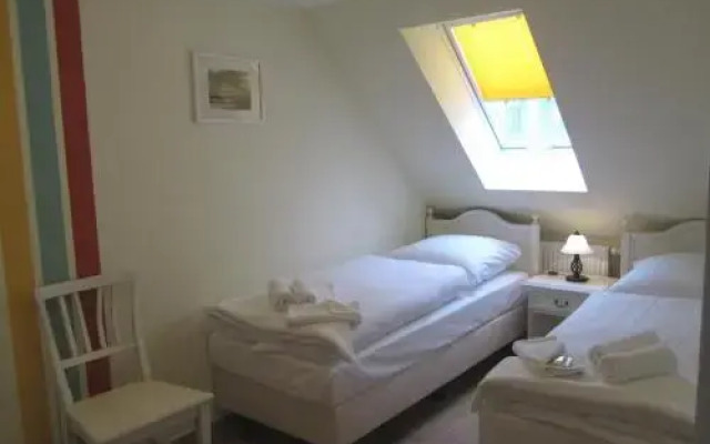 Apartmenthaus Hus Übi by Rujana
