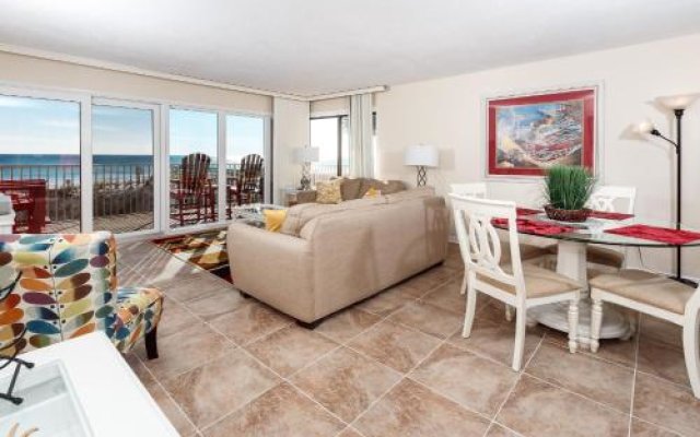 Gulfside 203:WRAP AROUND BALCONY, GORGEOUS UPGRADES - FLOORING AND FURNITURE!