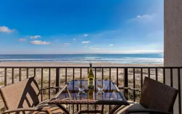 Gorgeous Oceanfront Views Condo with On Site Pool and Fully Covered Parking by RedAwning