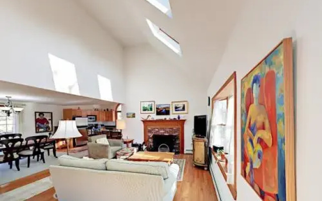 Woodsy Cape Cod Home by RedAwning